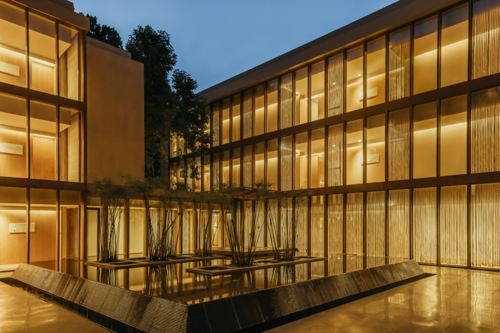 Reflection pond and landscaped courtyard at Six Senses Vana