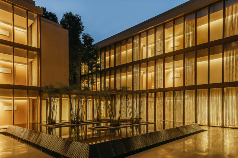 Reflection pond and landscaped courtyard at Six Senses Vana